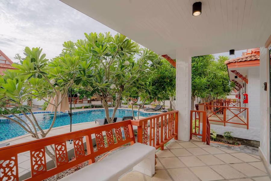 Private bungalow balcony with tropical garden views