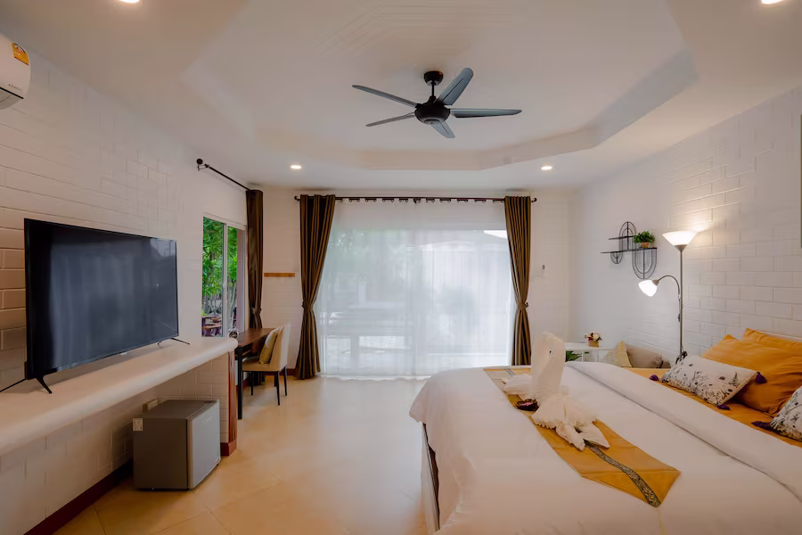 Premium accommodation bedroom with natural light