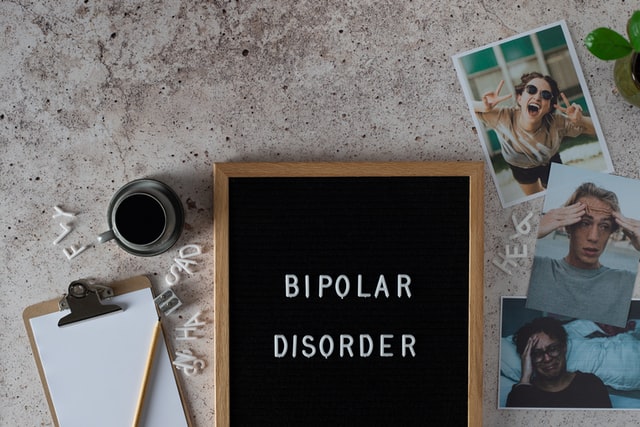 Bipolar-disorder-sign-with-photos-around-it
