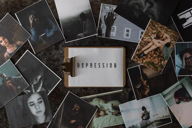depression-sign-and-photos-around-it