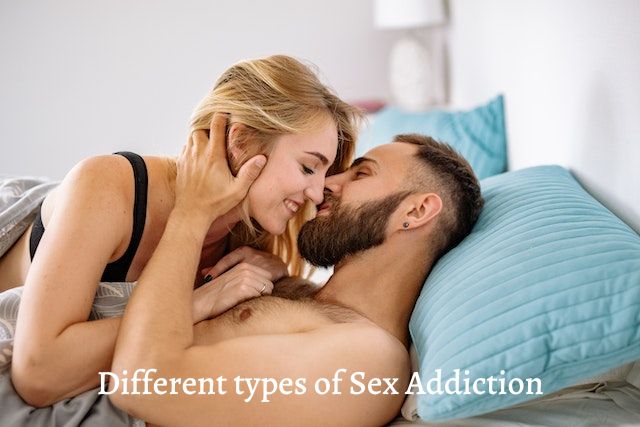 woman on top of a man in bed