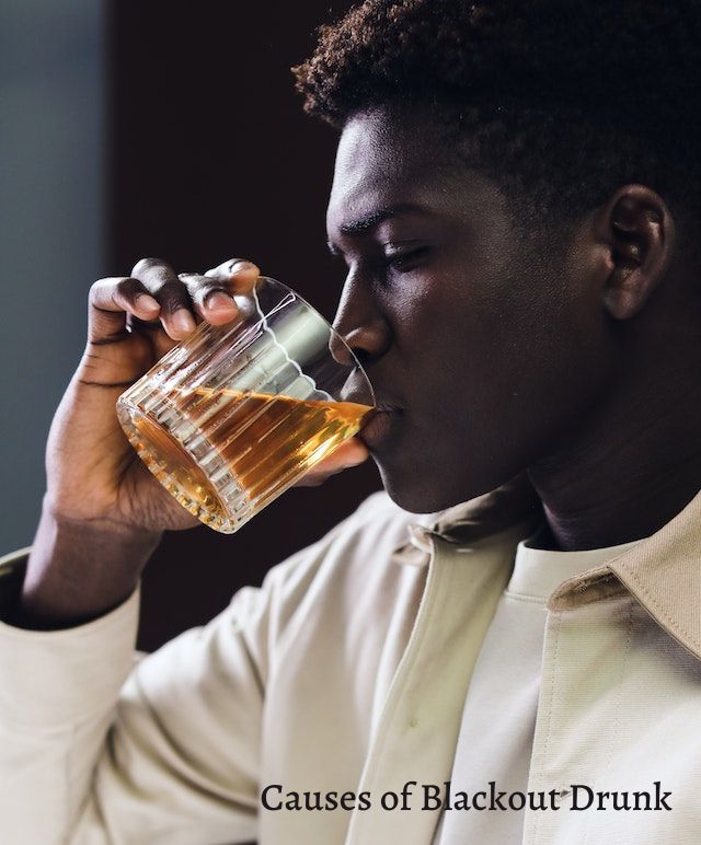 Man drinking from a glass.