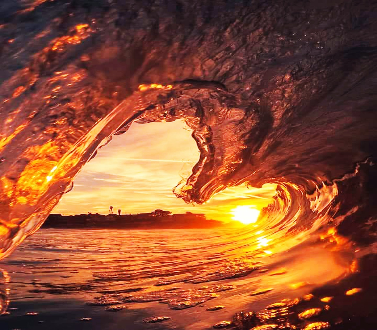 Sunrise and heart-shaped waves