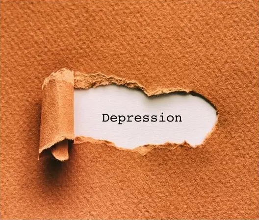 Teared-paper-with-Depression-sign-beneath