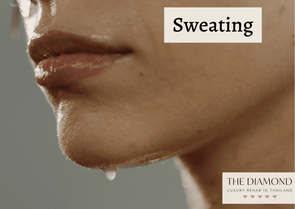 a sweat droplet about to drop from the face of a woman