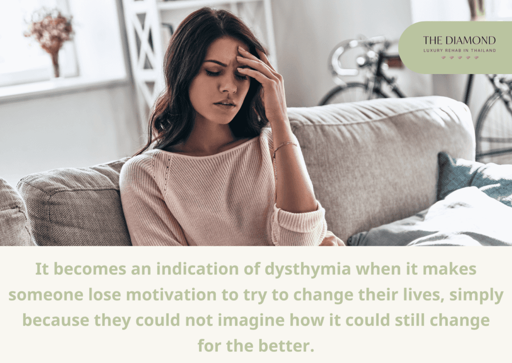 a woman holding her head