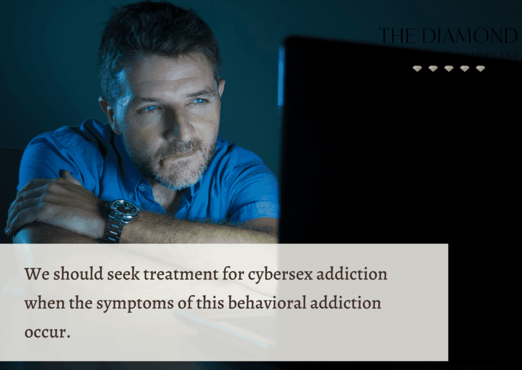 man watching laptop seductively