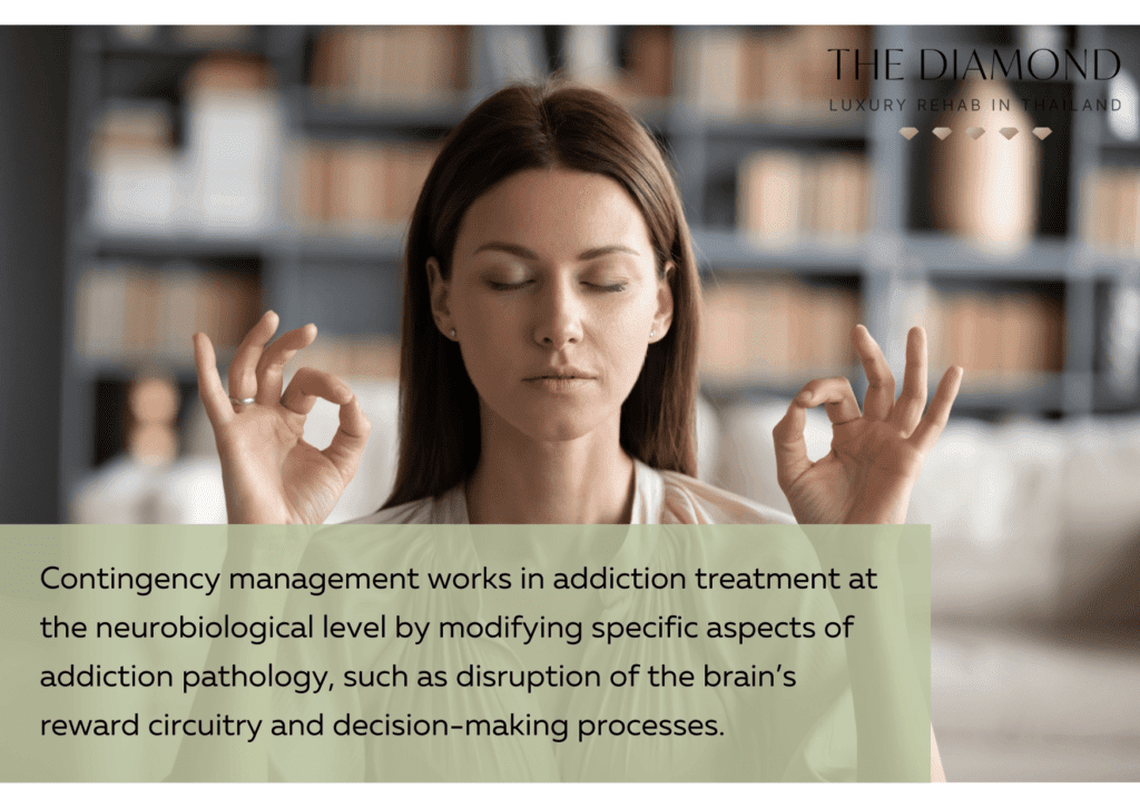 A woman meditating with her hands up.