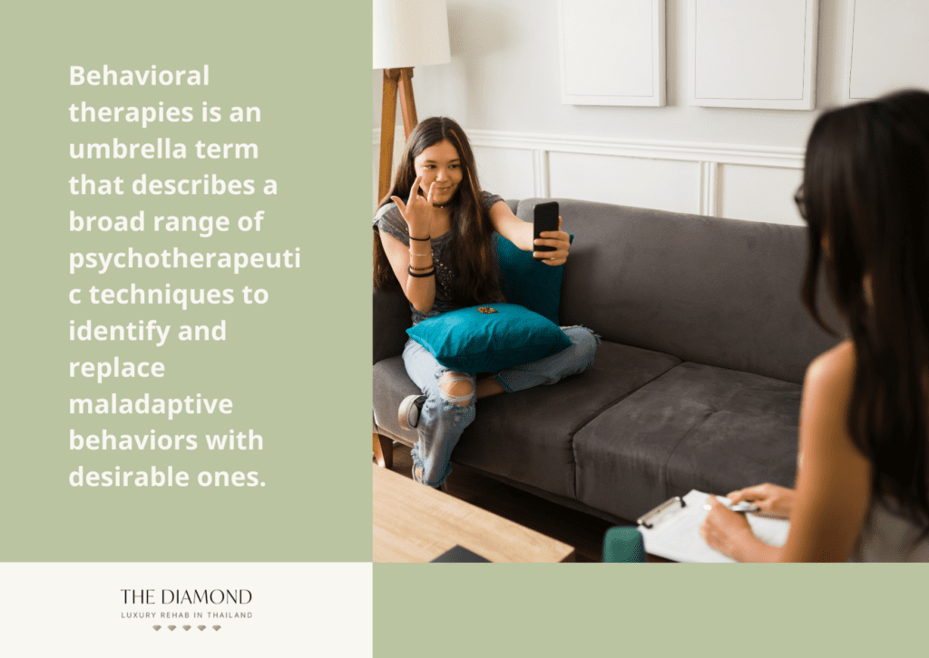 A therapist is sitting and a girl in front of her is busy clicking selfie.