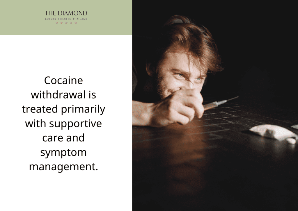 A man with drug filled syringe in hand and the cocaine packet on table.