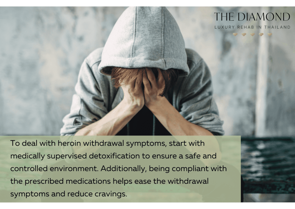 A man with hands on face.