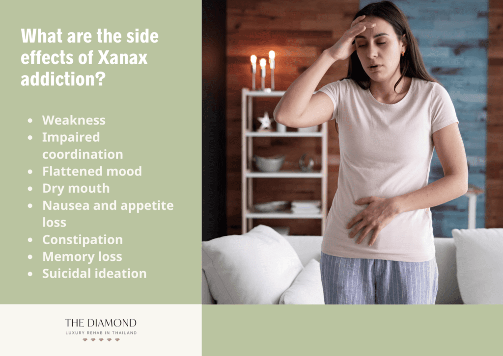 A woman feeling nausea, an effect of Xanax addiction.