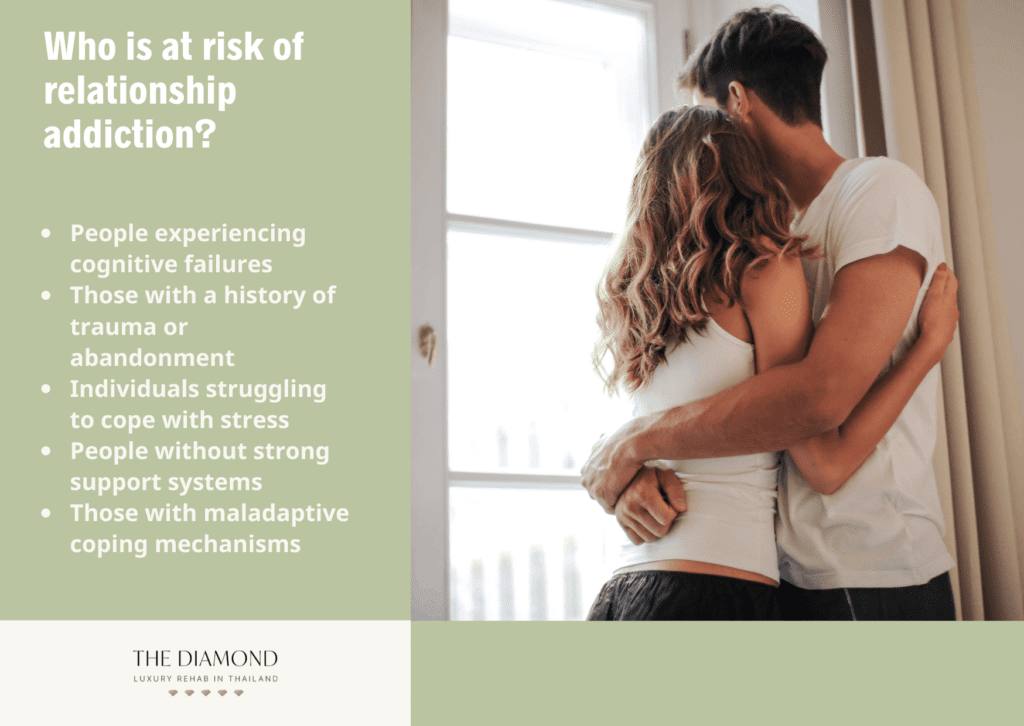 A woman is in the arms of a man.