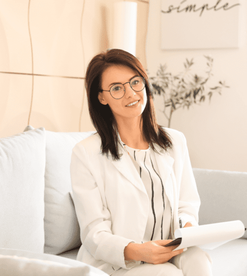 Addiction counselor sitting on a sofa