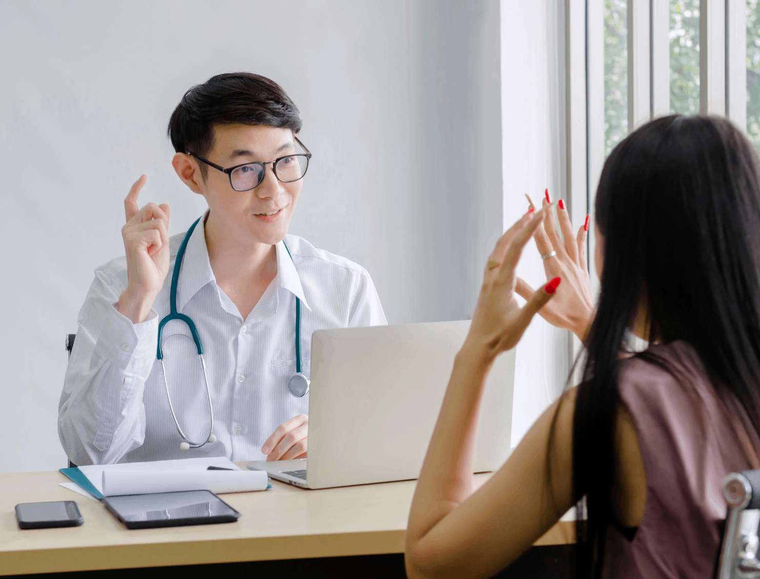 support specialists offering direction and emotional support to a woman.