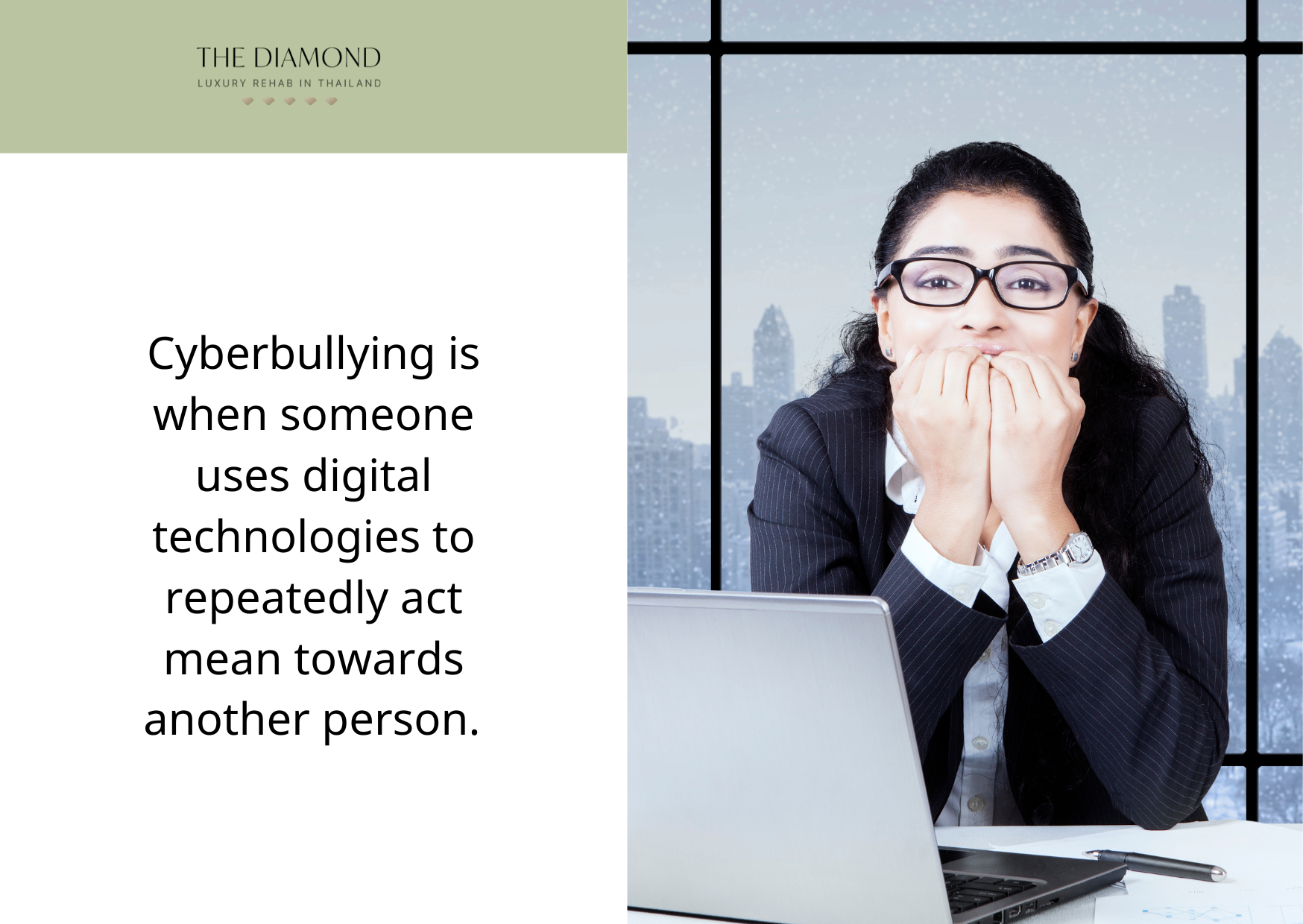 A picture of a worried woman sitting in front of a laptop.