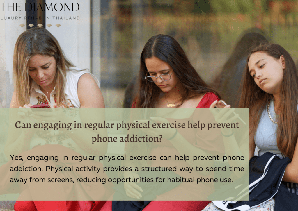 Three girls sitting and using their phone.
