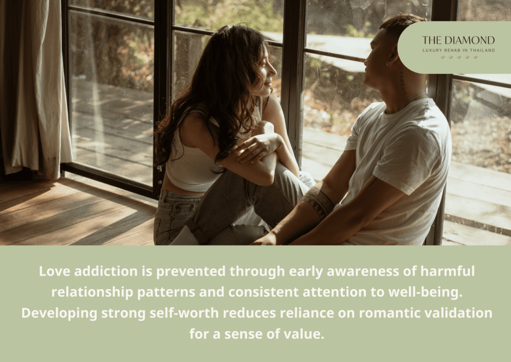 A couple in love sitting at the window.